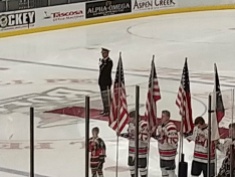 Singing the National Anthem on Military Appreciation Day during a local hockey game